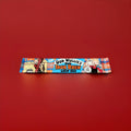 Oor wullie’s iron brew flavoured chew bar in a blue and tartan wrapper on a red background 