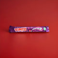 Vimto flavoured chew bar in a purple and red wrapper on a red background 