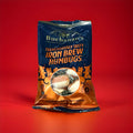 A packet of iron brew humbugs on a red background 