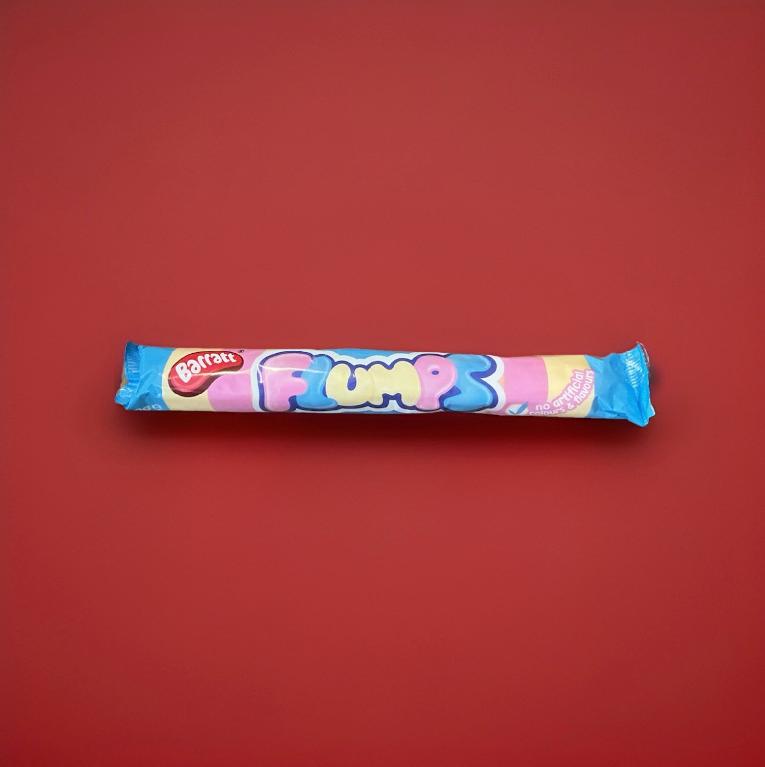 Long twisted marshmallow in a pink blue and yellow wrapper 