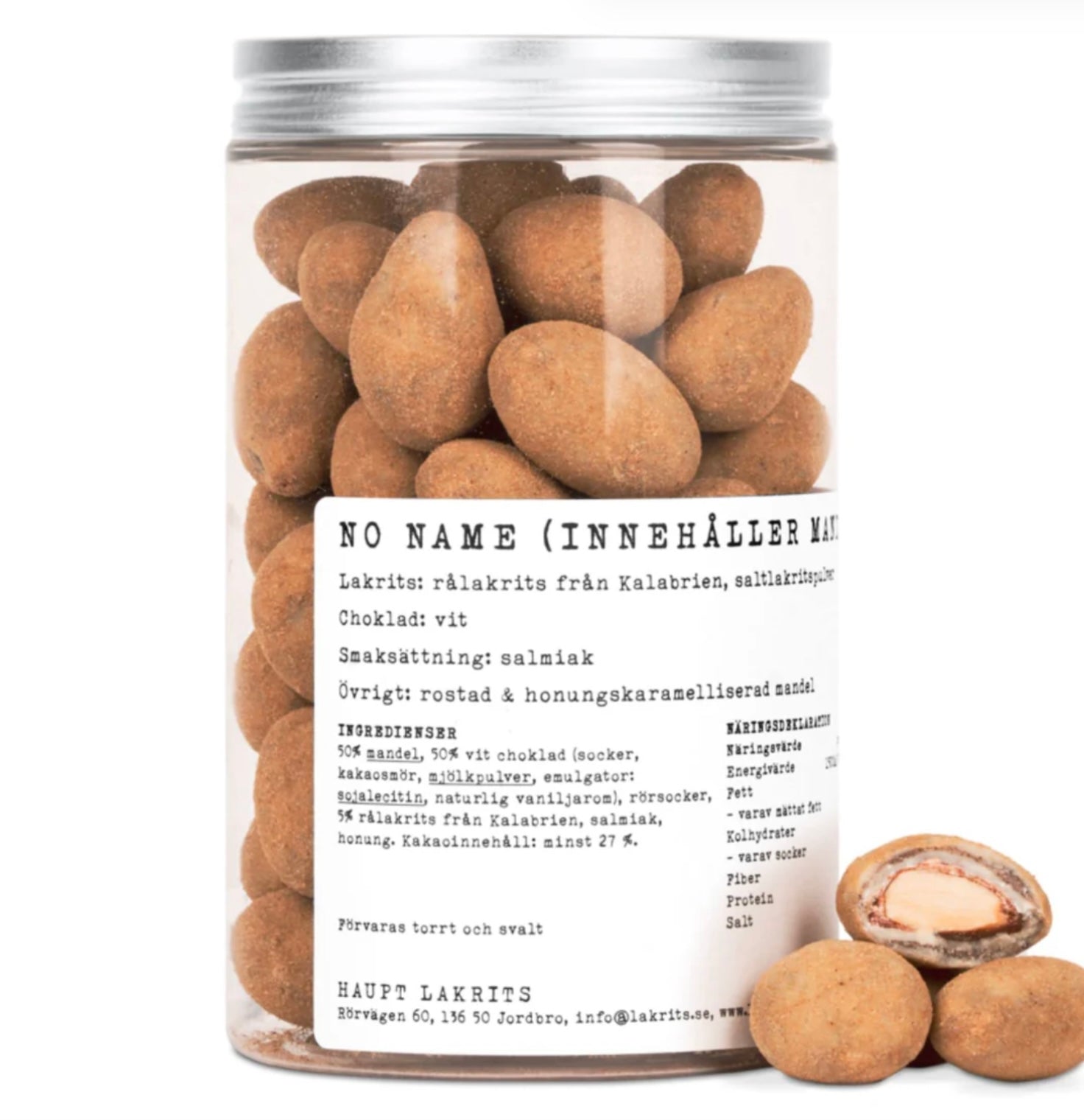 A jar of roasted honey caramelised almonds with white chocolate coating on a white background 