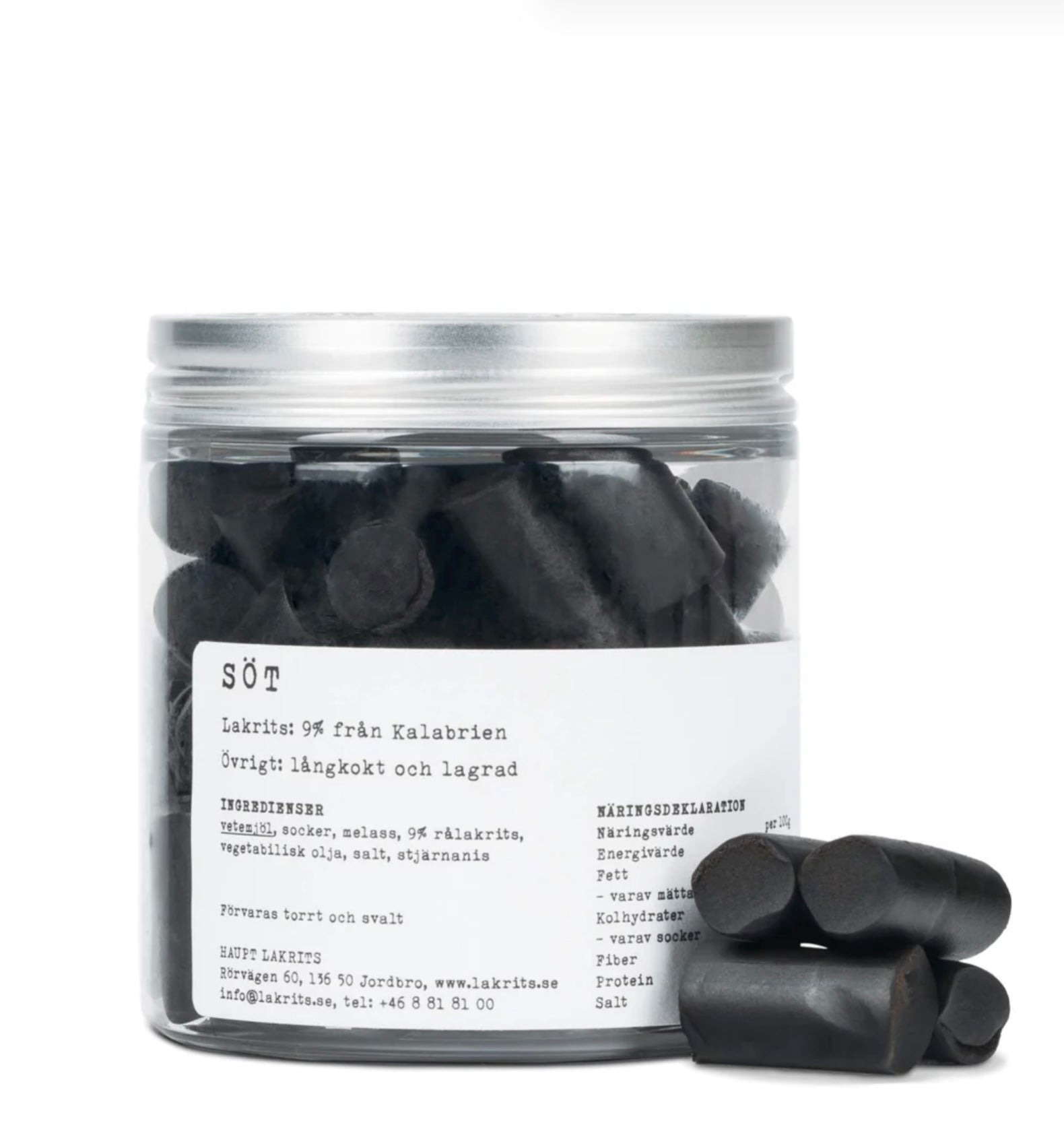A jar of slow cooked sweet black liquorice with a white background 